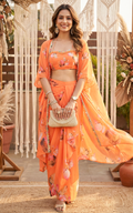 Ensemble coordonné orange à motif lotus avec crop top et jupe drapée