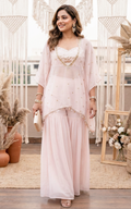Ensemble coordonné rose clair avec crop top à sequins et sharara